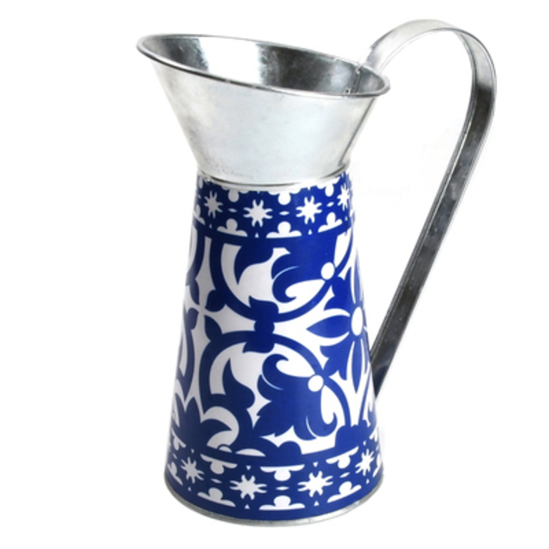 Metal jug with blue and white Portuguese design. Made by Fallen Fruits. This stylish jug would look lovely inside or outside.  The beautiful blue and white design will add atmosphere to any home or garden. Matching items with the same design are also available. Size: 12.7 x 20.8 x 25.1cm